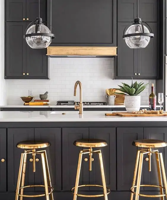 black and white kitchen with gold accents