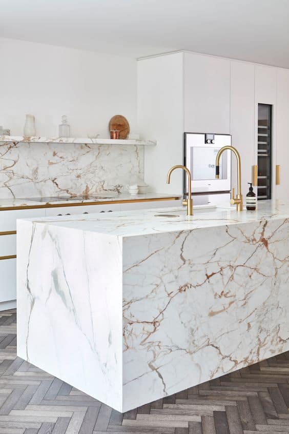 white kitchen with marble counter