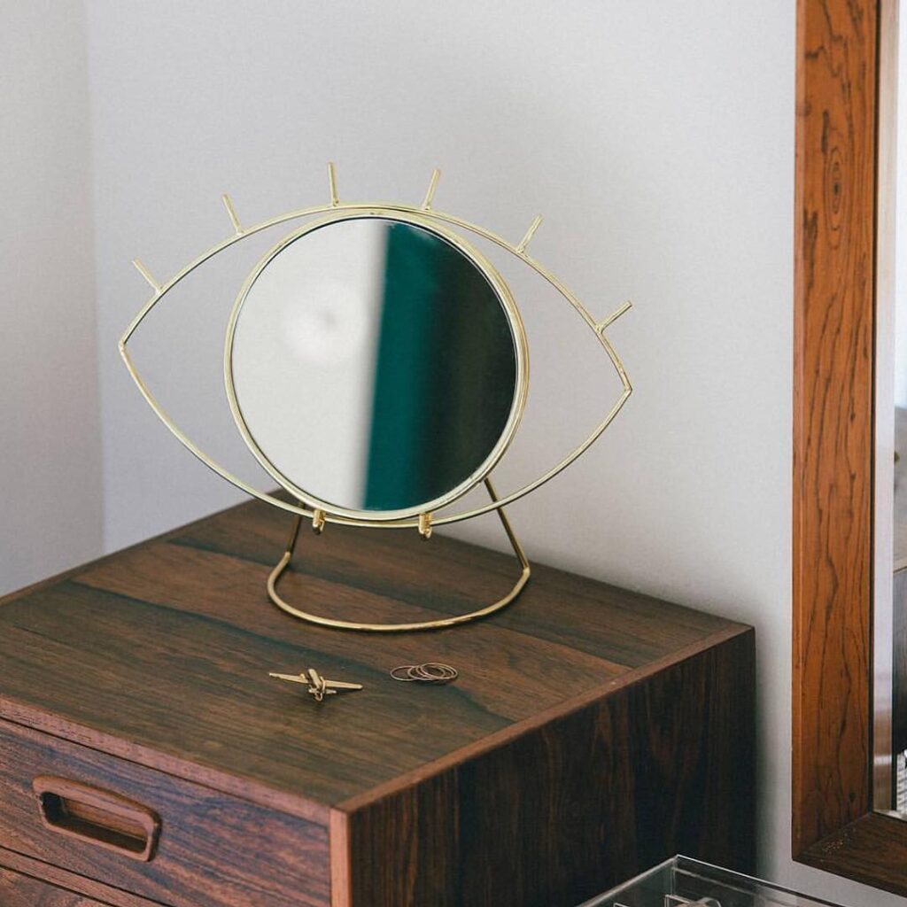 end table with frames mirror