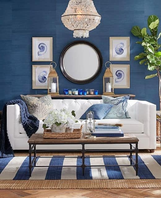 blue living room with gallery wall