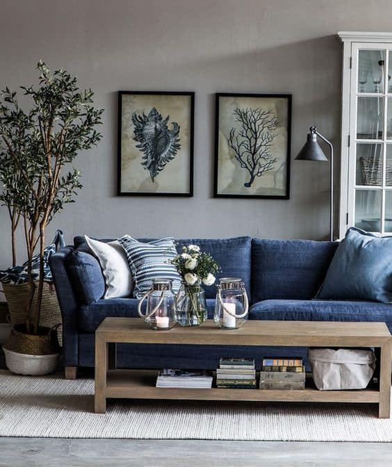 living room idea with blue sofa and plants