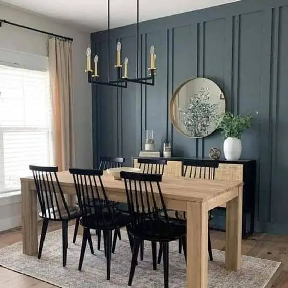 navy blue board and batten accent wall in dining room