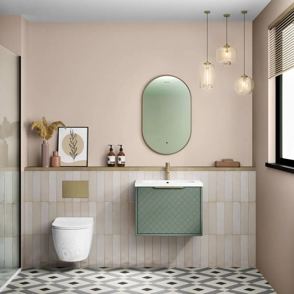 pink bathroom with sage green accents