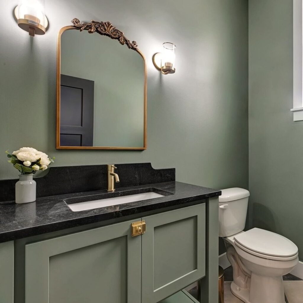 sage bathroom with sage cabinet