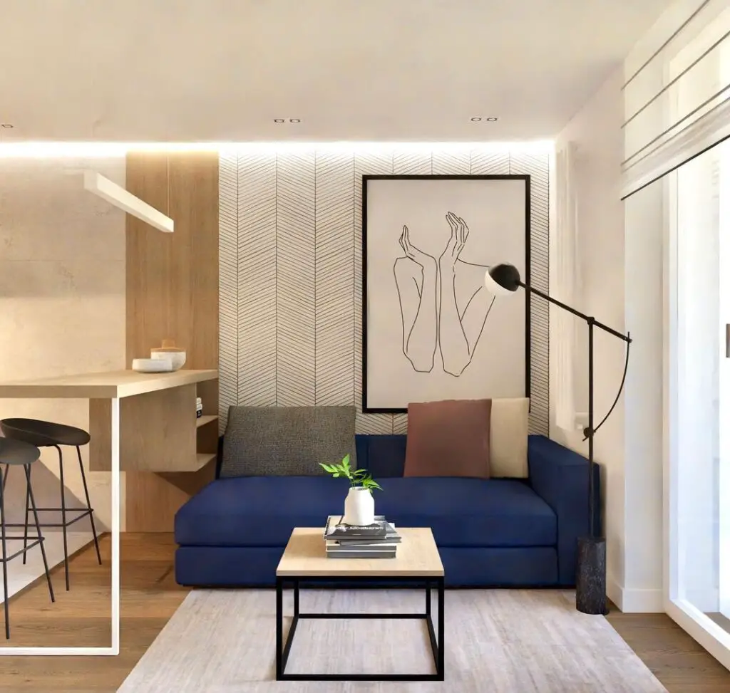 scandinavian style living room idea with blue sofa