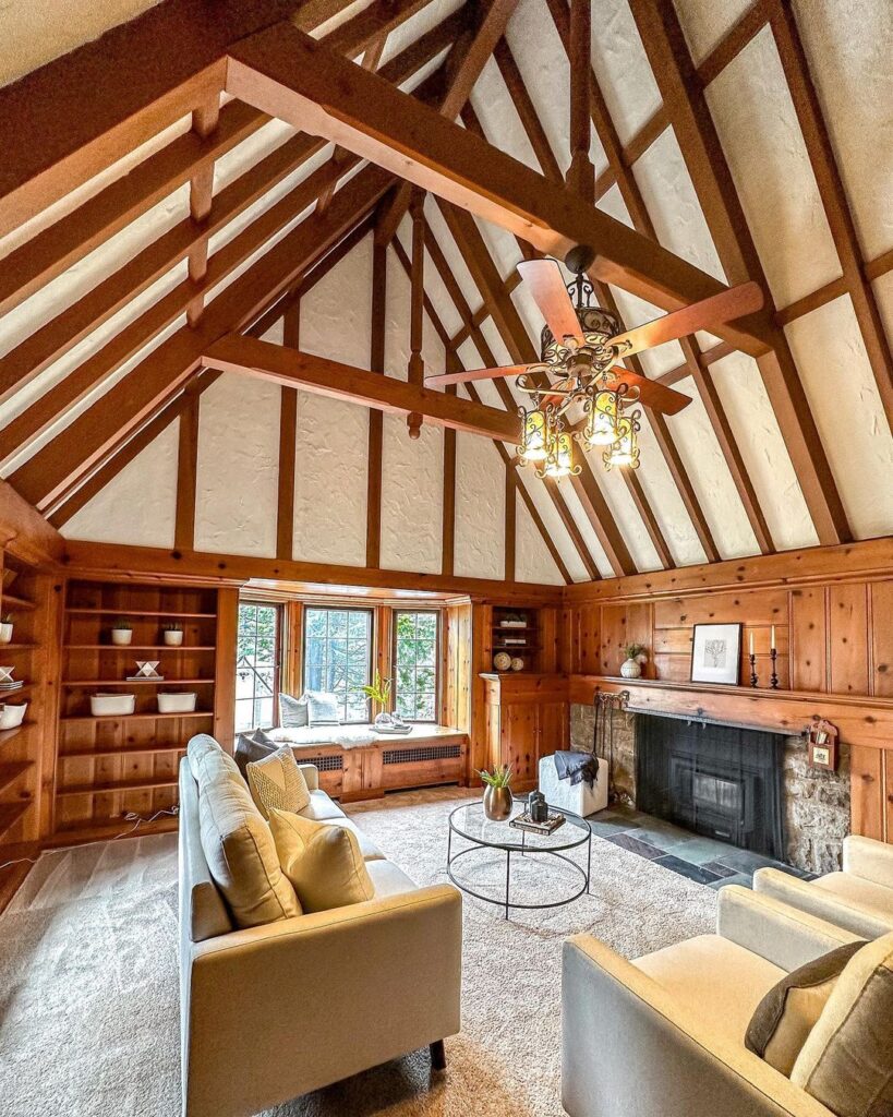 victorian style living room with vaulted ceiling